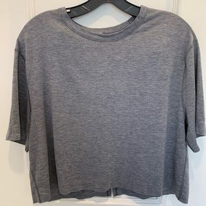 Lululemon grey slit back crop top. Size 10 M/L